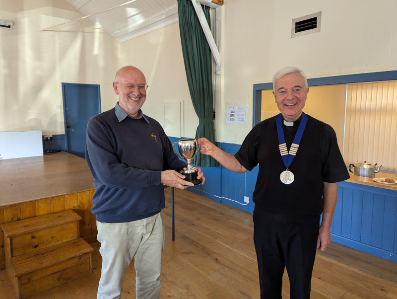 Chew Captain receiving the Trophy